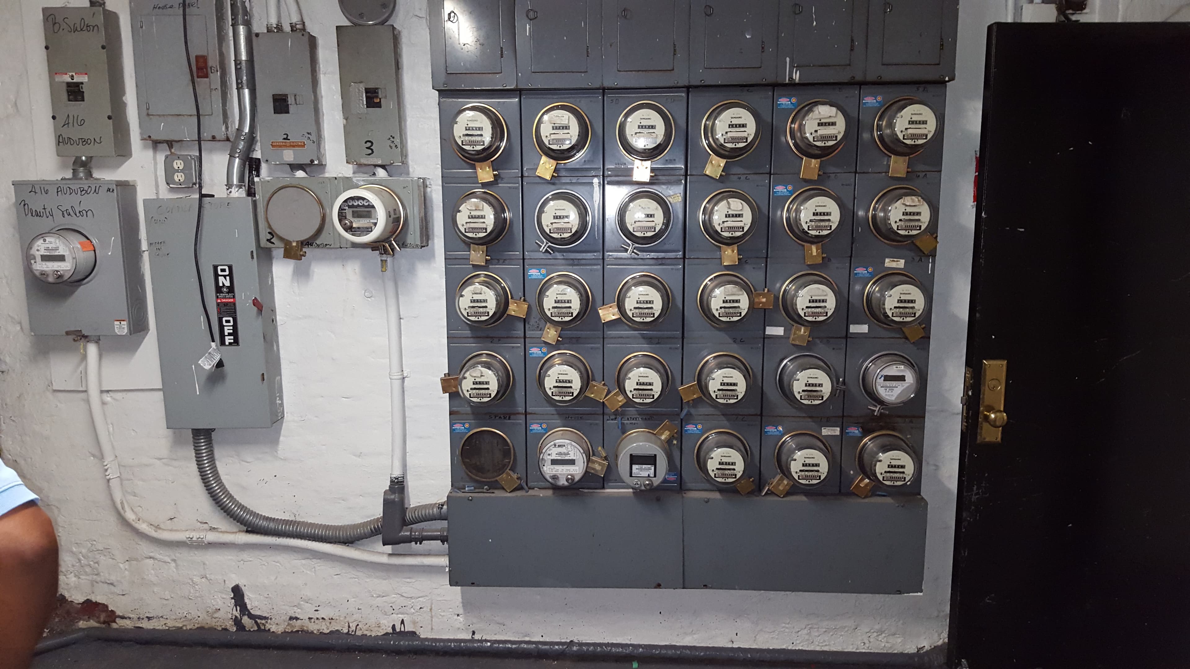 Wall of various electrical panels and meters